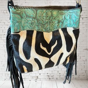 Crossbody hide purse with turquoise